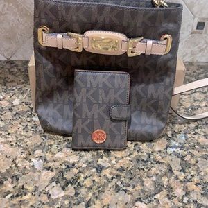Michael Kors crossover body bag and wallet that also holds a passport